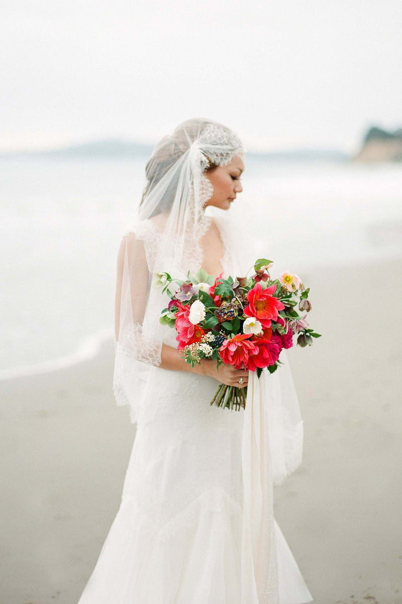 https://www.girlandaseriousdream.com/cdn/shop/products/Mar_scalloped_french_lace_silk_tulle_veil_ivory_bride_wedding_800x.jpg?v=1500604925